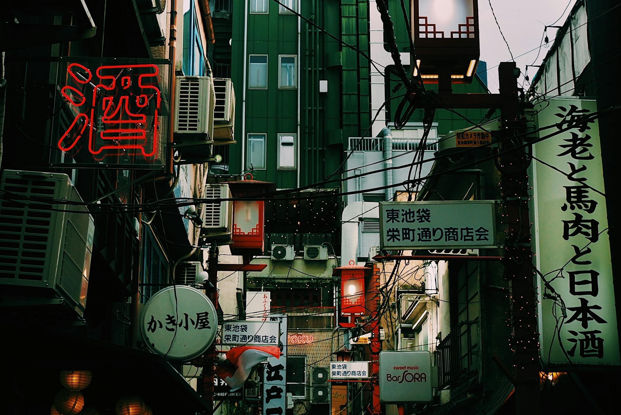 Neon-lit Tokyo street at night in Japan