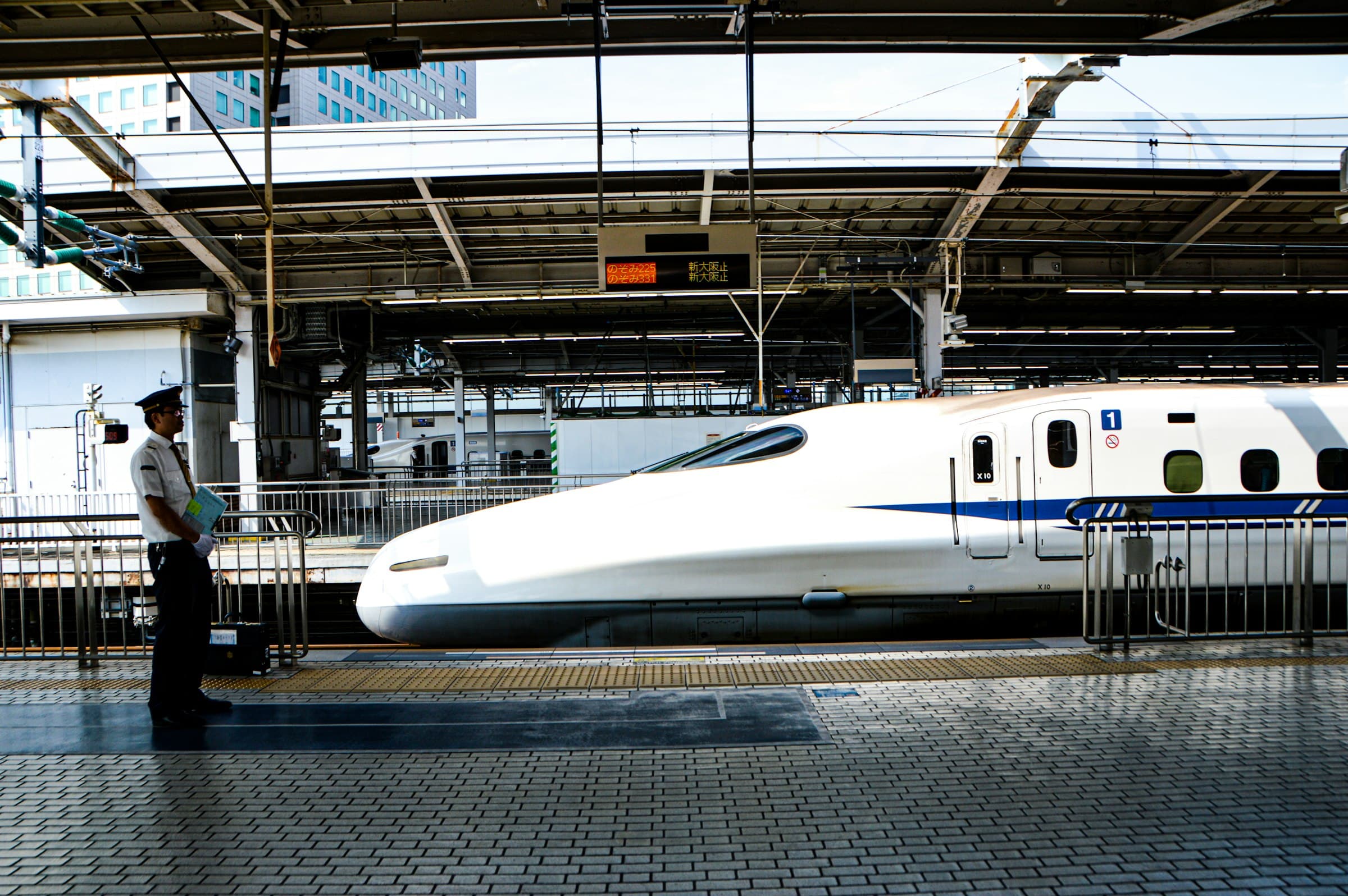 Shinkansen bullet train waiting at a station in Japan